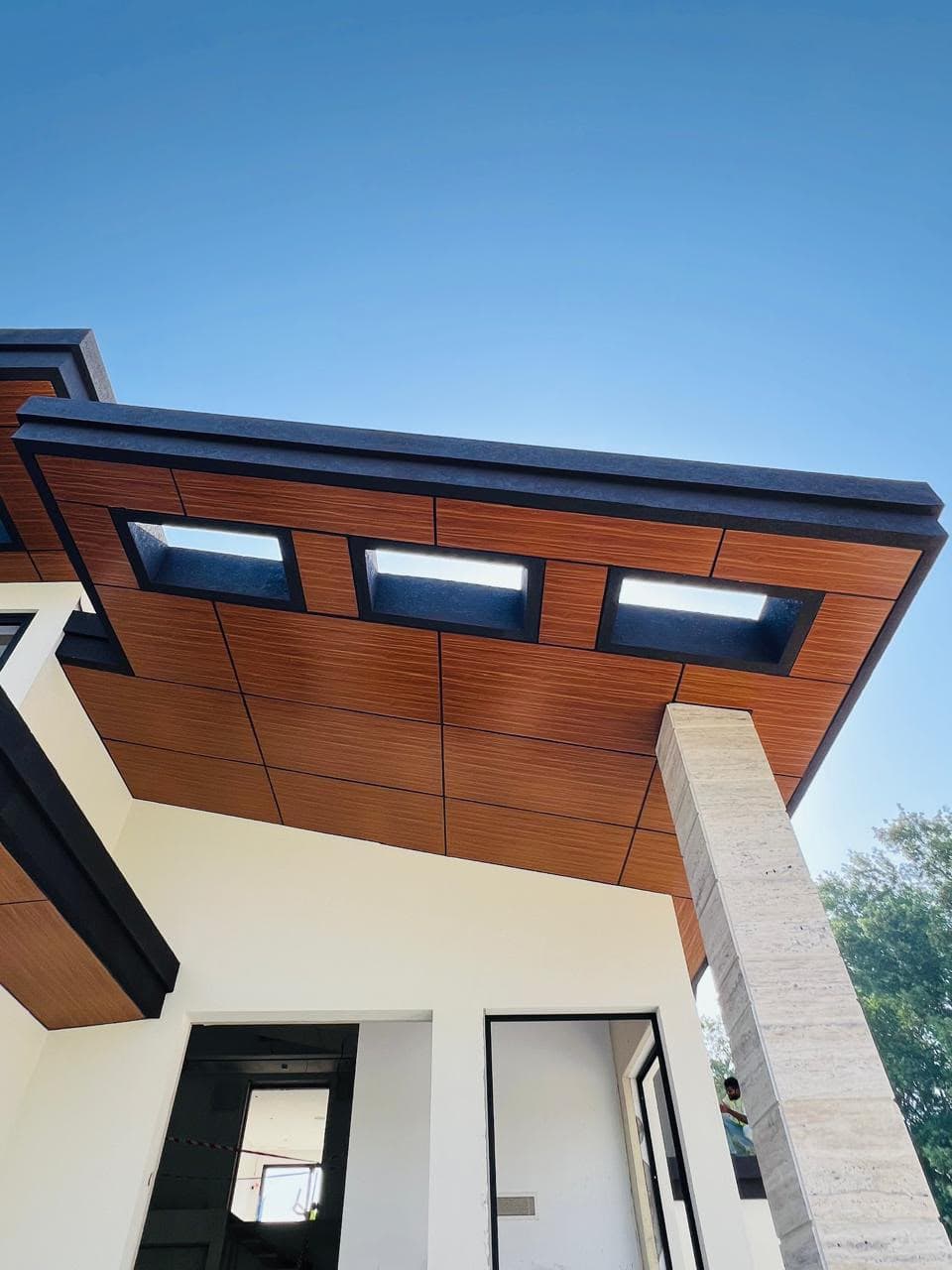 Aluminium composite roof panels under installation